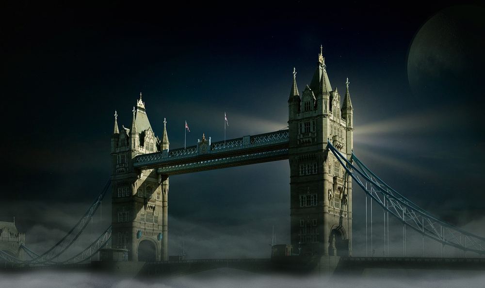 Tower Bridge illuminated at dusk, London