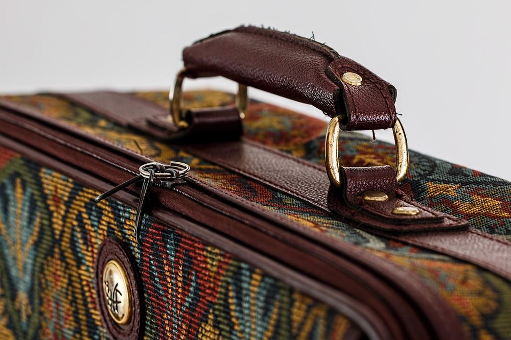 A packed suitcase ready for a UK travel trip